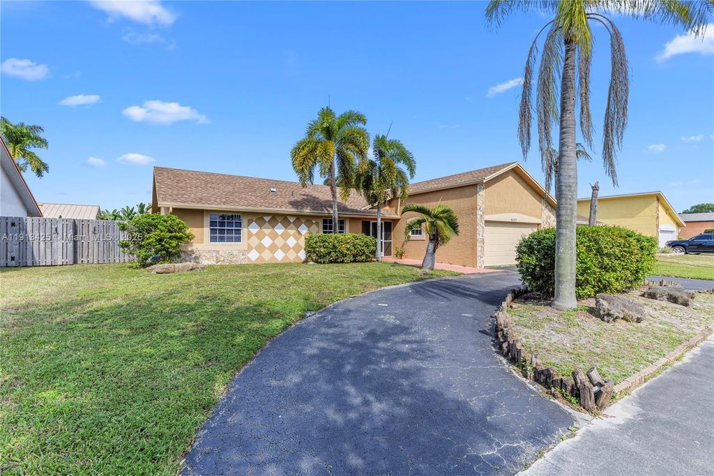 Photo of 8551 NW 53rd Ct, Lauderhill, FL 33351 (MLS # A11913425)