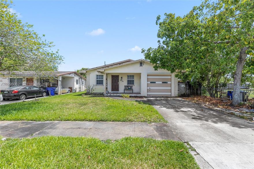 Welcome to this beautifully maintained 3/2 home located in a desirable neighborhood in Hollywood. This home has been beautifully updated with a chef style kitchen, bathrooms and vinyl flooring throughout. There is a versatile den that can be used as a formal dining room or flexible living space adjacent to the kitchen. The garage was converted to a family room, however garage door is still functional w/storage behind it. There is hurricane impact windows. The backyard offers privacy, room to enjoy family and friends and a shed with power. The home is located minutes to the Hard Rock Hotel & Casino, major highways, shopping, and beaches.