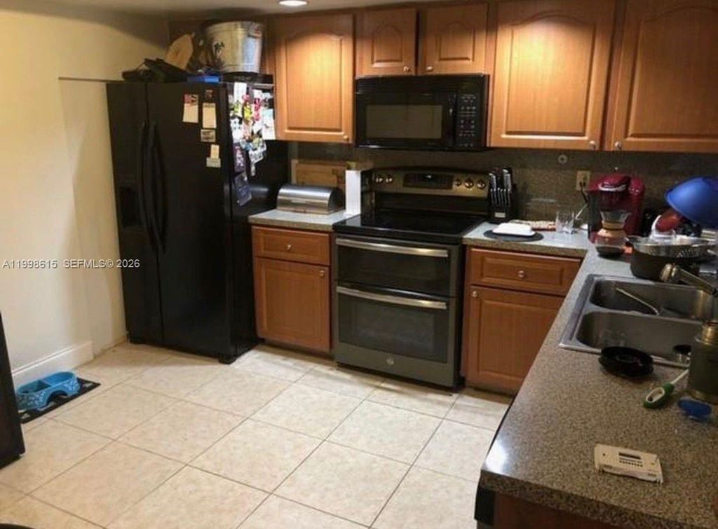 Photo of 10161 W Sunrise Blvd #102, Plantation, FL 33322 (MLS # A11998615)