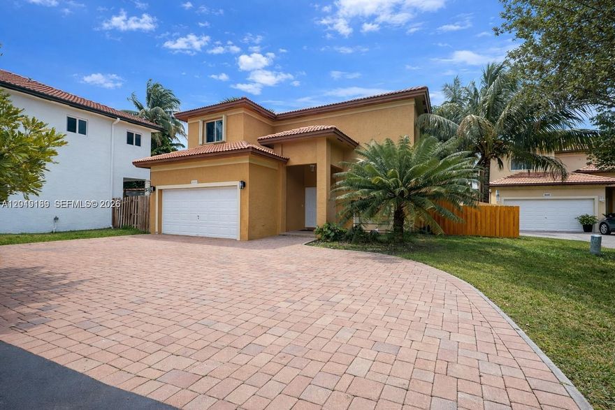 For those looking for a backyard and the feeling of having your own piece of land. Beautiful property with space to park up 8 cars and unique overside lot. Remodeled bathroom and laminate flooring on the second floor. The garage has been converted into a studio offering ADDITION income potential. The charter school Waterstone, Club house, shopping center, security 24 hours, close to the turnpike.

Easy to show, SELLER MOTIVED