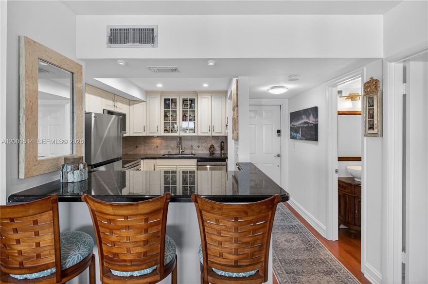 Beautiful top-floor 1-bedroom, 1-bath waterfront residence with sweeping Middle River views from every room, ideally located in the heart of prestigious Coral Ridge just off Bayview Drive. This move-in-ready home features full impact windows and doors, brand-new stainless steel appliances, rich hardwood floors, an updated bathroom, fresh interior paint, and a spacious screened balcony where you can unwind, enjoy stunning sunsets, and watch boats pass by. This charming boutique building offers a waterfront pool, community BBQ area, private dock for convenient pick-up and drop-off, plus a dedicated storage unit. Covered parking space. Plenty of guest parking. Perfectly situated in a walkable neighborhood close to the Galleria Mall, excellent dining, shopping, and only minutes to Las Olas and a short bike ride to the beach. Low HOA and outstanding value make this a true Fort Lauderdale gem! 2 cats allowed. Professionally documented ESA welcome.