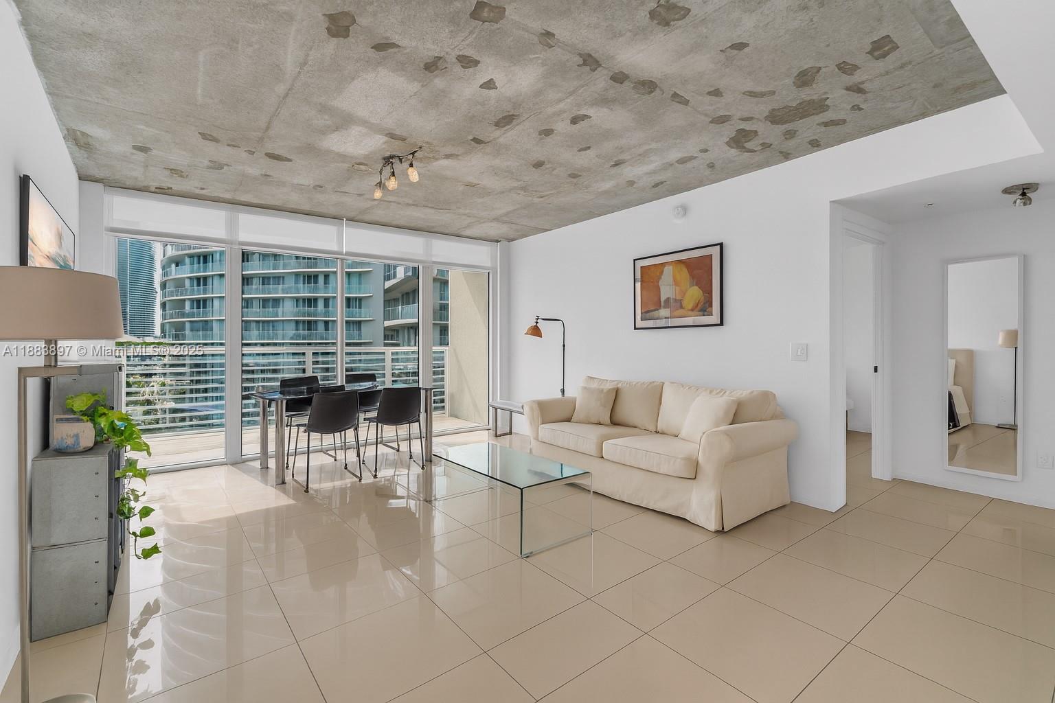 Airbnb-approved investment opportunity in Midtown! This top-floor corner condo at Midblock is a rare find, offering unmatched flexibility as the only building in the area with true mixed-use zoning allowing rentals for as little as 1 day. Perfect for investors, the building is equipped for seamless hosting with on-site management, clear short-term rental guidelines, and excellent security. The penthouse-level location ensures privacy with no upstairs neighbors and convenience near the elevator. A brand-new exterior A/C system keeps the interior quiet and comfortable, while the east-facing exposure provides cooler temperatures and sweeping views of the water Midtown, and Miami Beach.unit includes 2 storage units on the 4th floor, adding extra value and practicality for owners and guests.