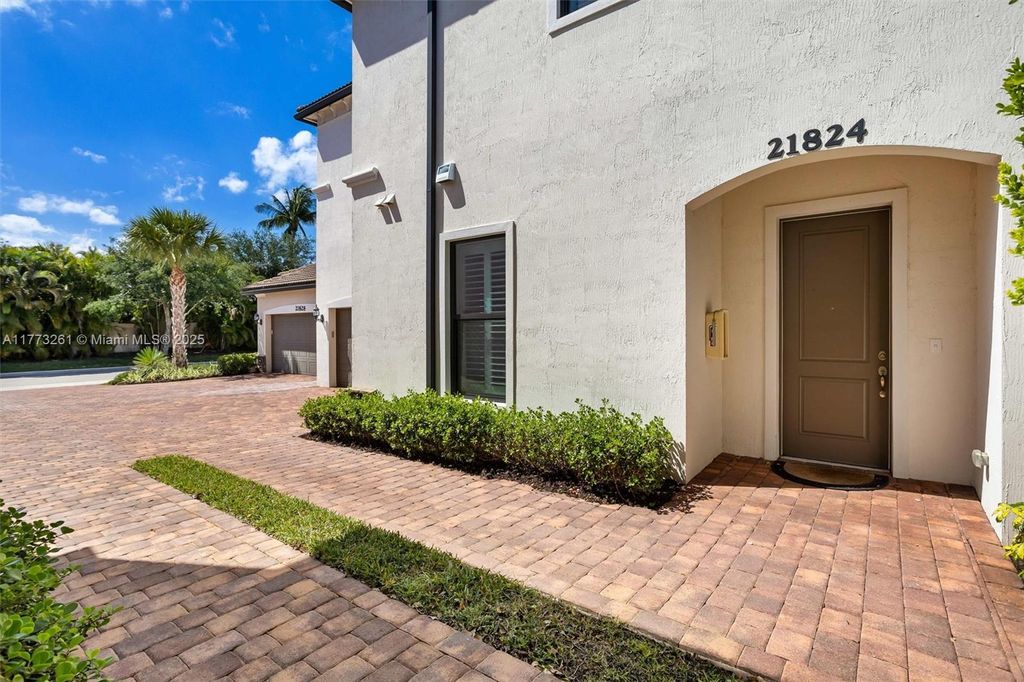 Photo of 21824 Canadensis Cir #102, Boca Raton, FL 33428 (MLS # A11773261)