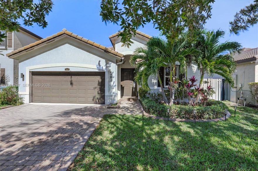 Stunning 3-bedroom, 2-bath home located in the desirable Hemingway Point community in Homestead. This move-in-ready residence is impeccably maintained and offers a bright, open-concept layout that seamlessly connects the kitchen, dining, and living areas—perfect for everyday living and entertaining. The split-bedroom floor plan provides added privacy, with generously sized bedrooms and ample closet space throughout. Step outside to a spacious, low-maintenance backyard featuring concrete slabs and lush turf, ideal for hosting gatherings or relaxing outdoors. Additional features include accordion shutters throughout and a convenient two-car garage. Low HOA of only $45 quarterly. A must-see—schedule your private showing today! OPEN HOUSE March 1ST 3:00PM-5:30PM.