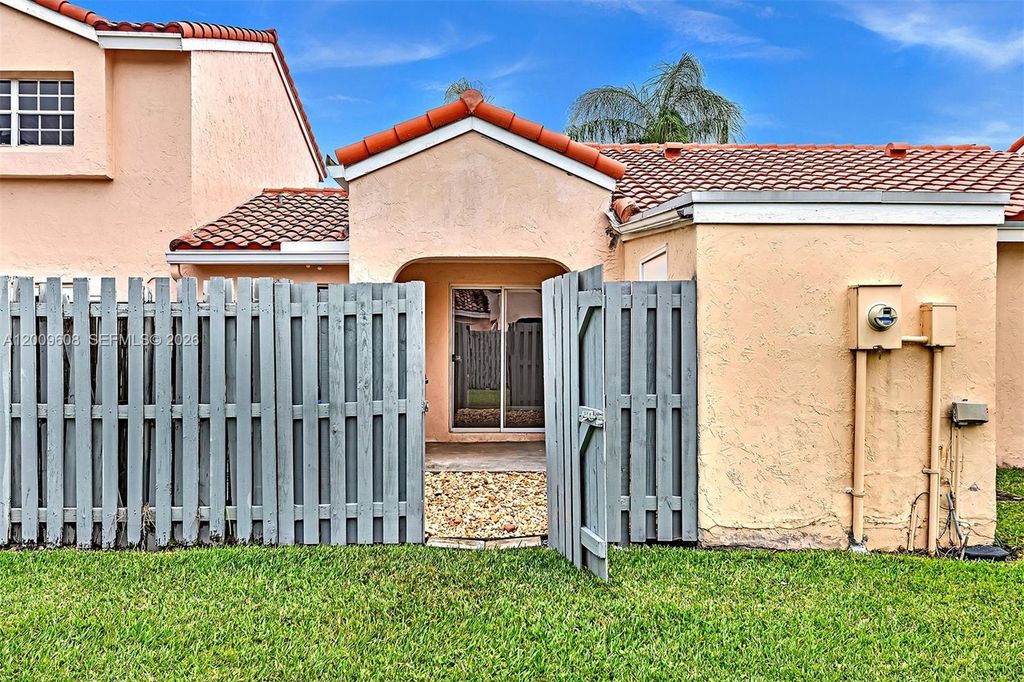 Photo of 1439 Springside Dr #1439, Weston, FL 33326 (MLS # A12009608)