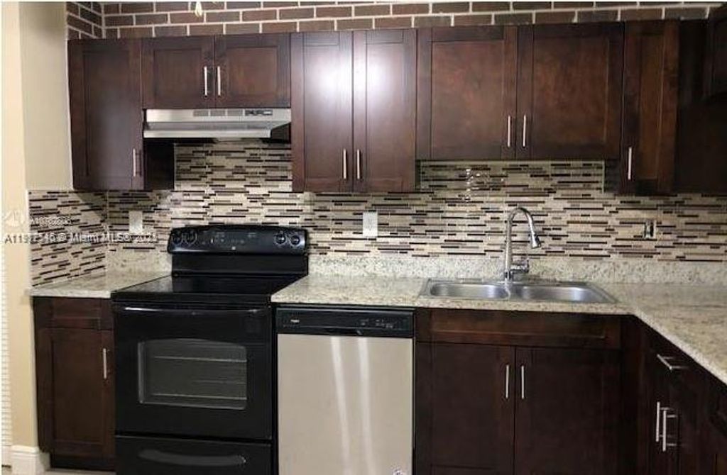 Photo of 4943 NW 82nd Ave #203, Lauderhill, FL 33351 (MLS # A11912146)