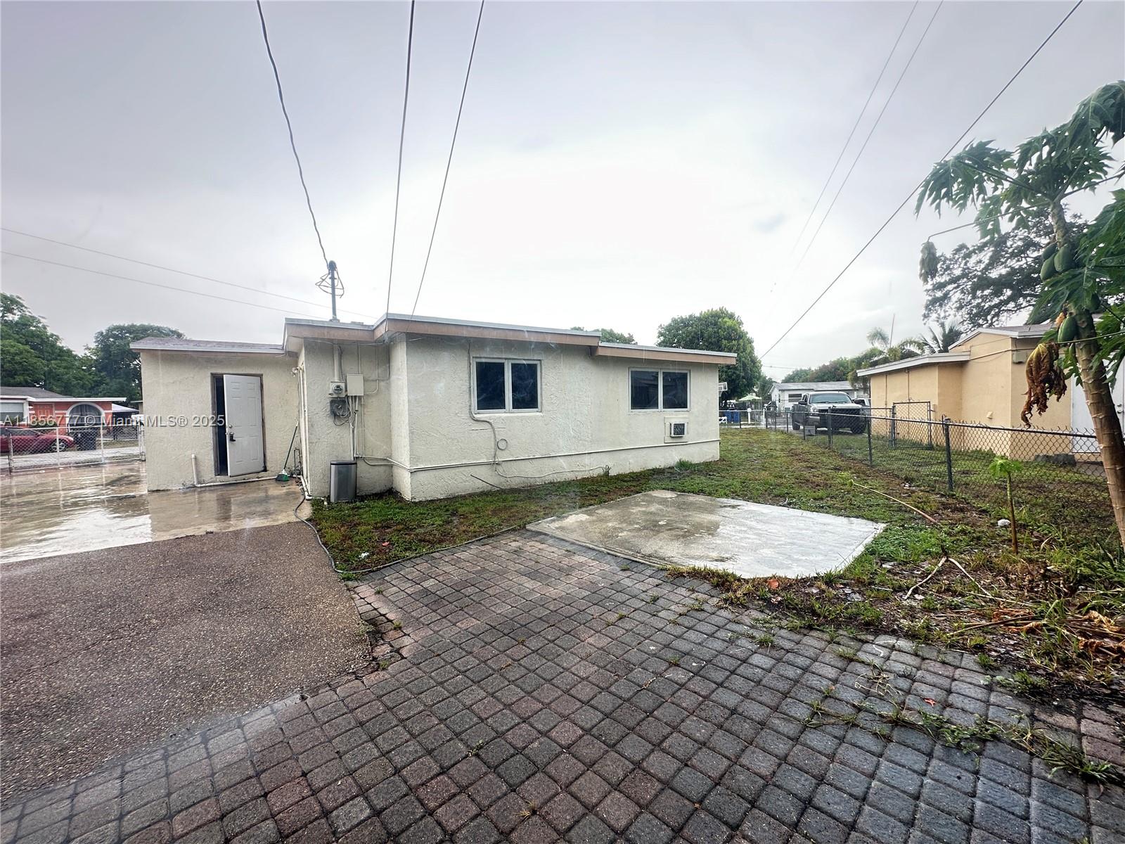 CENTRALLY LOCATED WITH HUGE FENCE BACKYARD (4 FT TALL METAL FENCE) 5 BEDROOMS, 2 BATHROOMS SINGLE FAMILY HOME, BEAUTIFUL KITCHEN KITCHENS CABINETS, TILE FLOOR, CENTRAL AC, & WALL A/C EXCELLENT LOCATION IN FORT LAUDERDALE, WASHER AND DRYER HOOK UPS, OWNER WILL RUN BACKGROUND TO ALL 18+ OCUPANT, PETS ALLOW WITH A $300 PET FEE, NON AGGRESSIVE BREEDS , TENANTS PAY FOR ALL UTILITIES, AND MAINTAIN LANDSCAPE, EASY TO SHOW, VACANT, ON LOCKBOCK, OWNER REQUIRE $200.00 WATER DEPOSIT. RAPID APPROVAL, NO ASSOCIATION.