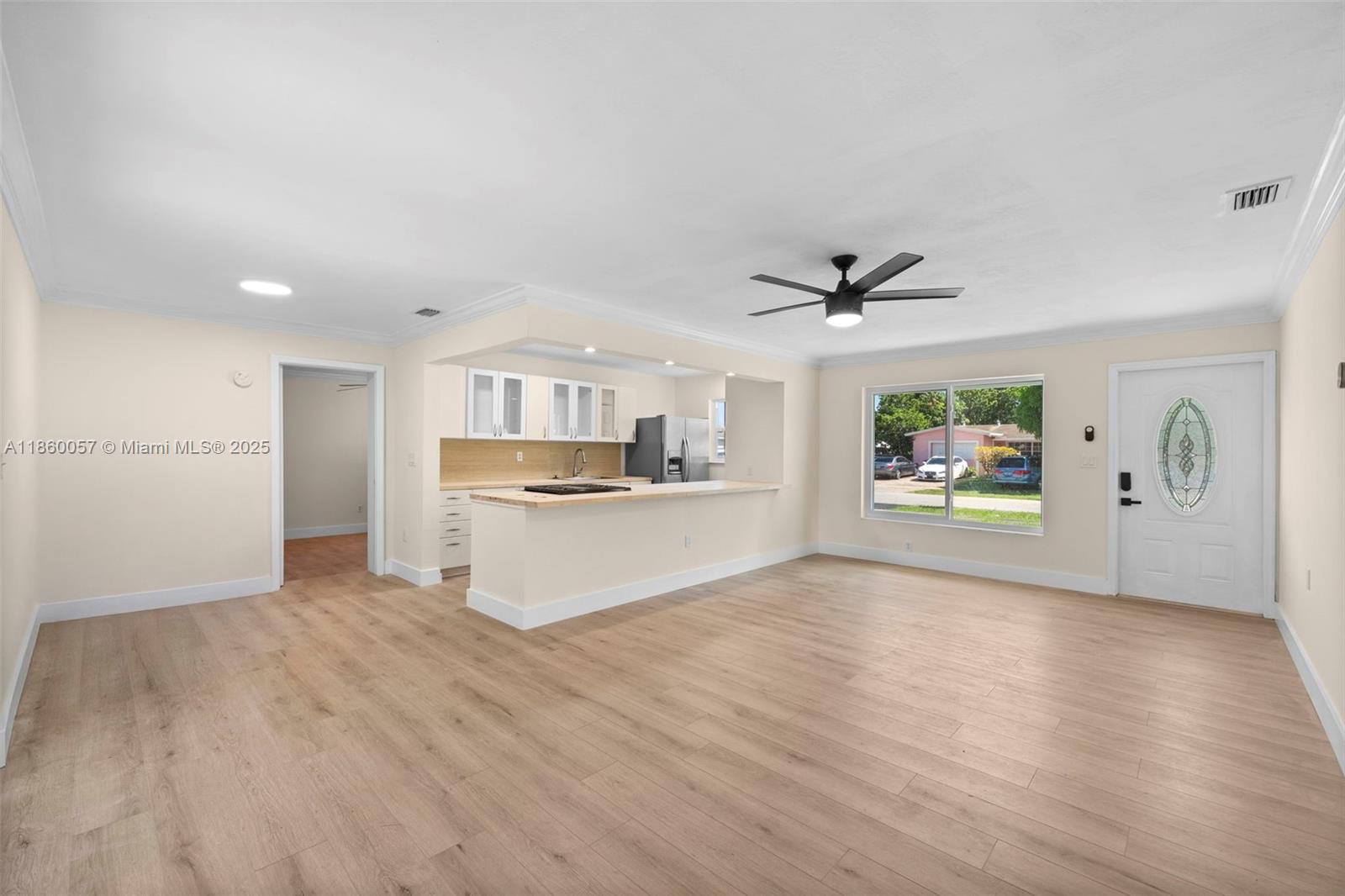 Beautiful 3BR/2BA home in Sunrise Golf Village on a spacious corner lot! New Interior Featuring 1,200 sq ft of living space with new floors throughout, new kitchen. Enjoy a large fenced backyard with plenty of room plus a circular driveway for easy parking. Great location close to the Turnpike, shopping & dining. Move-in ready