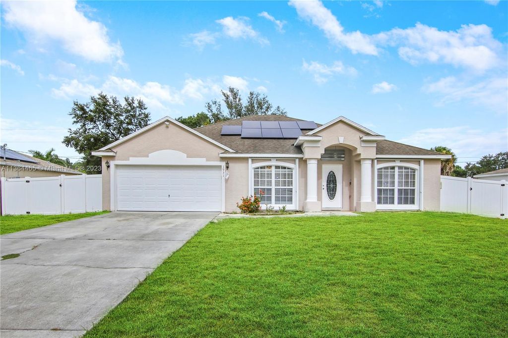 Photo of 1931 SW Aguero St, Port Saint Lucie, FL 34953 (MLS # A11364465)