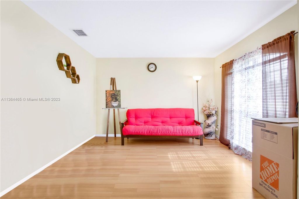 Photo of 1931 SW Aguero St, Port Saint Lucie, FL 34953 (MLS # A11364465)