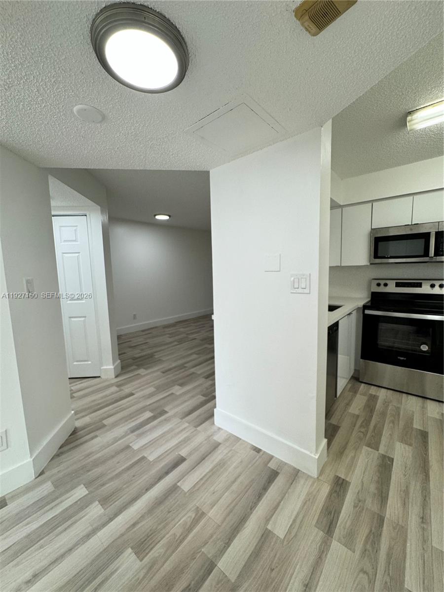 NAPOLI GARDENS AT CORAL S - Residential