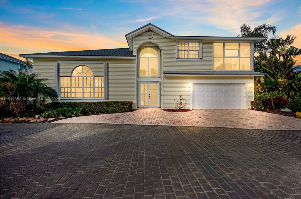 Photo of 506 Xanadu Pl, Jupiter, FL 33477 (MLS # A11512652)