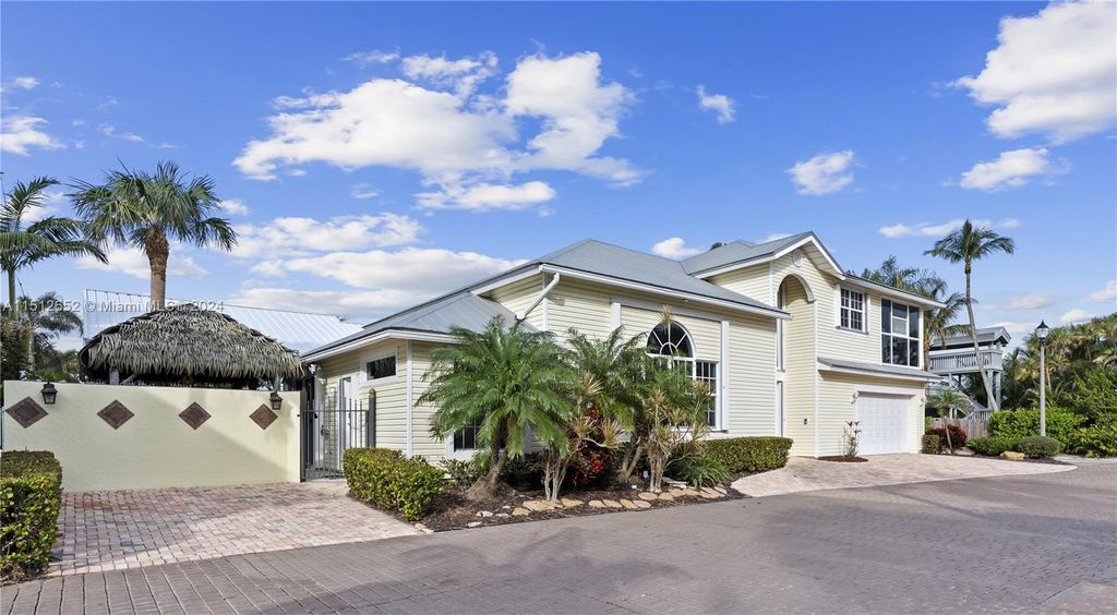 Photo of 506 Xanadu Pl, Jupiter, FL 33477 (MLS # A11512652)