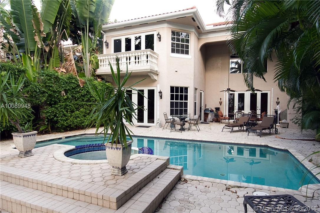 Waterfront - Best priced home in Golden Gates for the largest corner unit  in this private family community. Price includes deeded 40 ft dock on intracoastal waterway. Floor plan features high ceilings, balcony view of intracoastal from Master Bedroom, 2 bedrooms downstairs & 4 bedrooms upstairs. Eat in gourmet kitchen. Over 4,000 sq ft of living space. Impact windows throughout, private pool and spa, large front garden and backyard patio. Priced almost $1,000,000 less than comparable homes on the market!