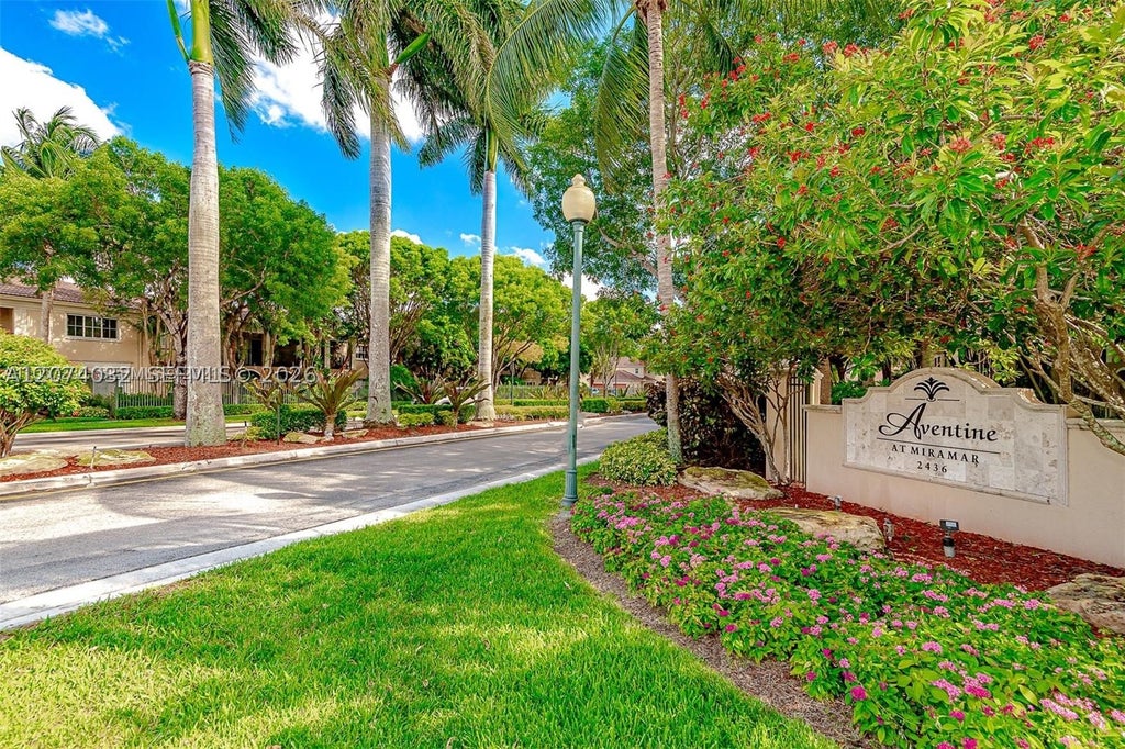 Photo of 2452 Centergate Dr #103, Miramar, FL 33025 (MLS # A12074032)