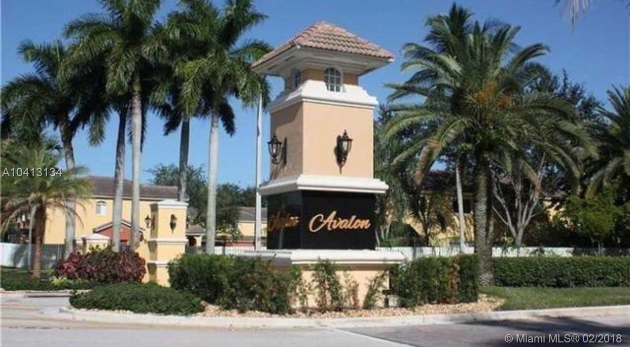 Amazing opportunity to own this beautiful townhome located inside the established community of Avalon in Miramar near main mall & more. 3 bedrooms 2 full bathrooms plus a half bath on the first floor , open layout through out the dining and kitchen, with a screen terrace! On the second floor you can walk into a loft that can easily turn into another room or office space , Large Master Bedroom & renovated bathroom ! laundry room on the second floor is a big plus. Unit has brand new roof , water heater , Ac unit & new garage doors and motor , accordion shutters on all windows.Low monthly association.