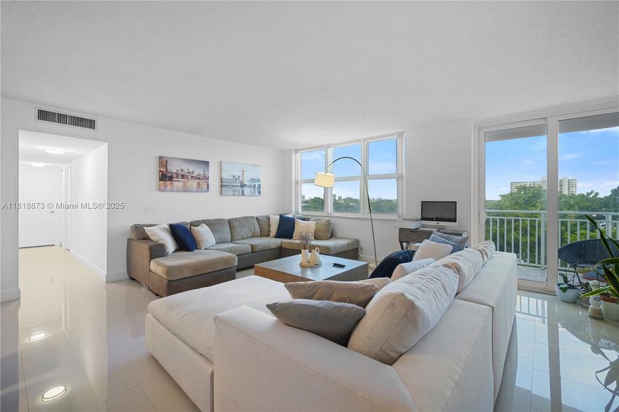 Located in the Heart of North Miami we present this stunning 2 bed 2 bath Condo for Sale in BAYVIEW TOWERS. Upon entrance, your greeted with a open concept layout with natural lighting. Spacious living room overlooking balcony. Updated kitchen with granite countertops, LED lights & stainless-steel appliances. New AC installed. Porcelain tile flooring throughout the unit. Bedrooms & Baths located down the hallway. The building includes amenities such as pool, gym, laundry on every floor, & lounge area. Central location! Close to I95 & EAST of US-1. lots of Local restaurants, shopping, FIU campus, Bay Harbor Island, Bal Harbor shops and mins from the beach! Association Fee Includes Water, Cable TV, High speed Internet, one assigned garage parking. Look No Further! CALL FOR SHOWING.