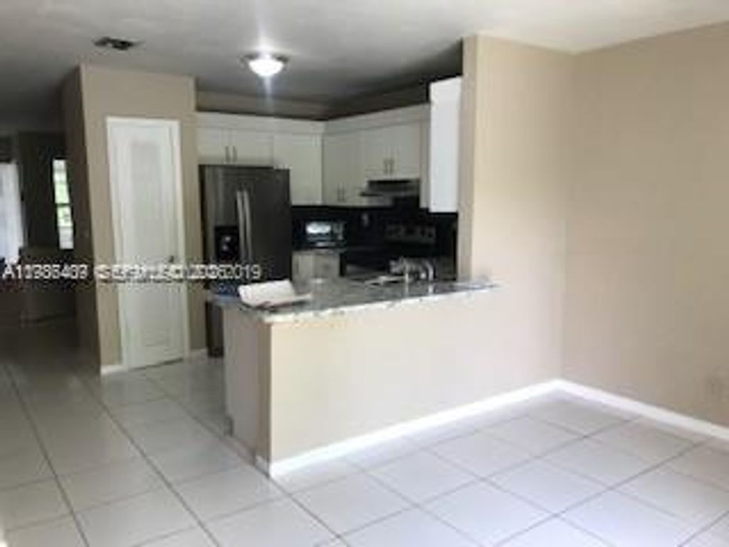 Photo of 6802 SW 18th Ct #6802, North Lauderdale, FL 33068 (MLS # A11986409)