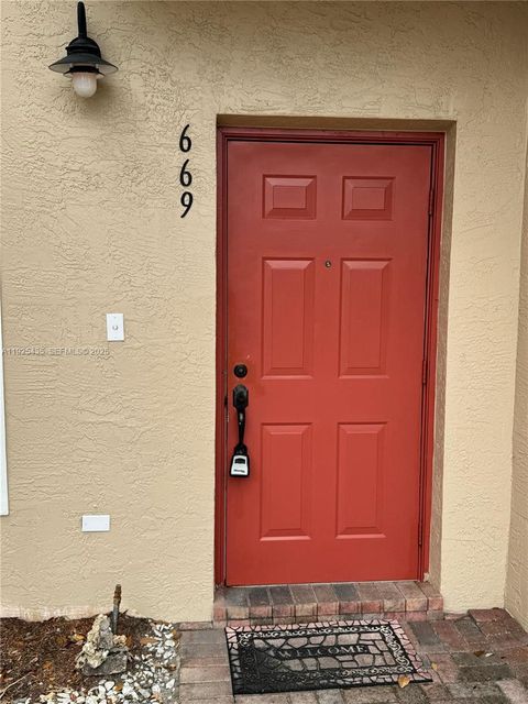 Photo of 669 NW 42nd Ave, Plantation, FL 33317 (MLS # A11925435)