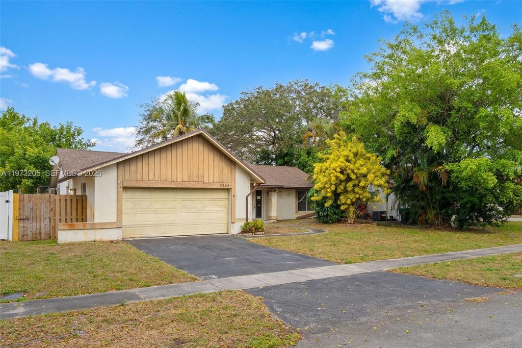Photo of 7389 NW 48th Pl, Lauderhill, FL 33319 (MLS # A11973205)