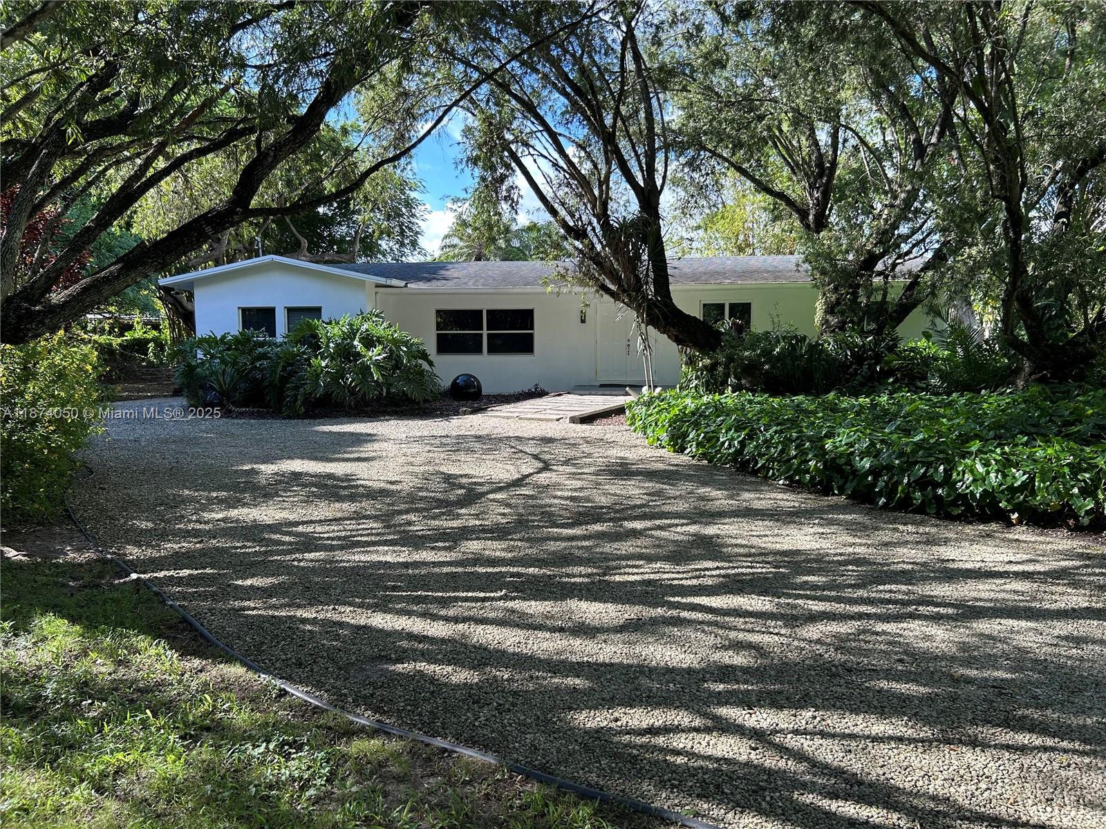 "JUST STUNNING" is the only way to describe this beautiful 4 bedroom / 2-bathroom home located in the most sought-after neighborhood in the Redlands. This completely renovated open-concept farmhouse features a large kitchen with stainless steel appliances (installed when occupied), a new roof, new energy efficient A/C, hurricane impact windows and doors, large bedrooms and a separate Master bedroom with ensuite bathroom. Additionally, this home has an additional room" that can be used as an office or a 5th bedroom. This pristine home sits on 1.43 acres of Manicured lawn, Fruit Trees and Exotic Landscape. Plenty of space for your Boat and RV. Included in this rental are two horse stables and a large storage shed on the property. Lawn maintenance included in the monthly rental.
