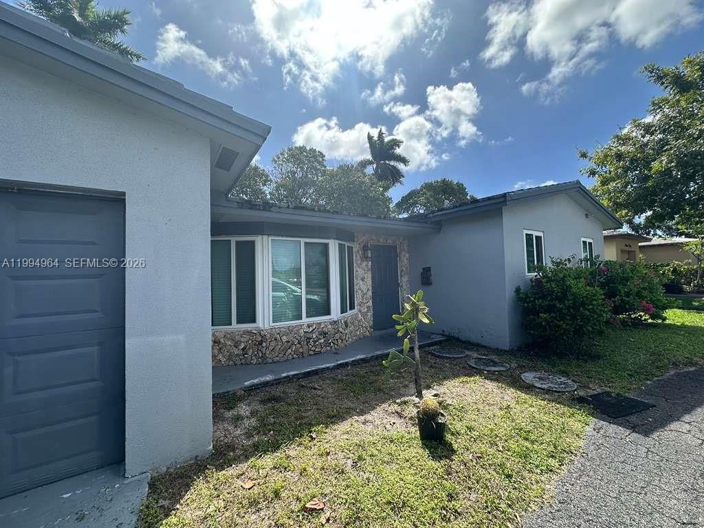 Photo of 1340 NW 56th Ave, Lauderhill, FL 33313 (MLS # A11994964)