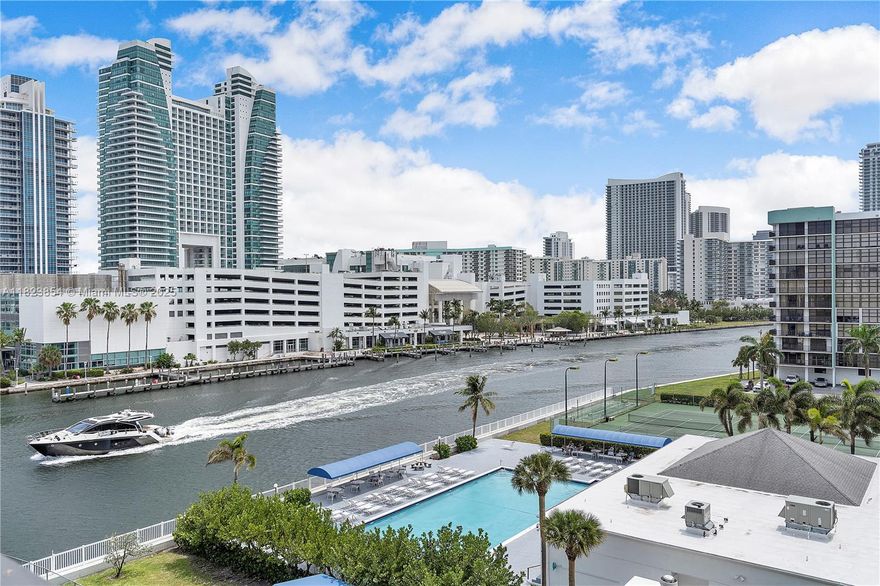 Discover your perfect coastal retreat in Hallandale Beach! This beautifully updated 1-bedroom plus versatile den, 1.5-bath residence offers stunning canal and ocean views from floor-to-ceiling windows in every room.

Featuring a modern, non-popcorn ceiling, laminate flooring, and a thoughtfully upgraded kitchen and bathrooms, this home is move-in ready. Additional highlights include 1 deeded covered parking space, extra storage, and the financial peace of mind that comes with full reserve funding and all assessments already paid in full.

The building’s extensive amenities include a sparkling intracoastal pool, sauna, tennis courts and gym, making this a true resort-like escape — all within minutes drive to the beach, shopping, and dining. 

Call listing agent to schedule your tour!