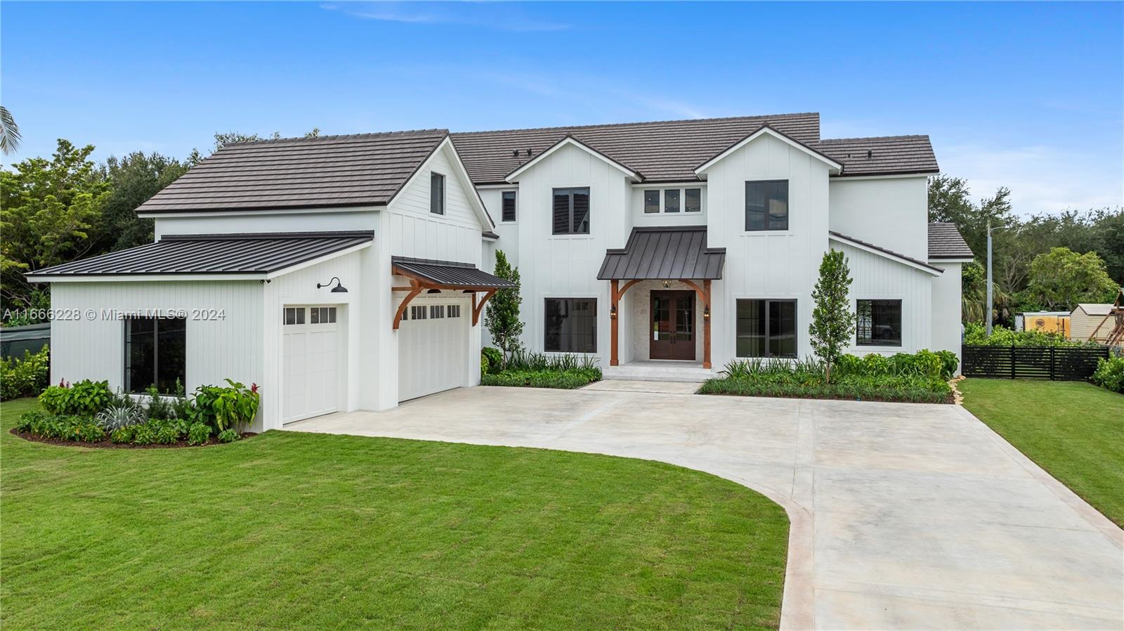 Indulge in luxury with this newly built 5-bedroom, 5.5-bathroom estate spanning 4,966 sq. ft. The interior boasts a bonus room with an additional 600 square feet and a dramatic spiral staircase, impact windows throughout, a living room with soaring ceiling height and a cozy butane fireplace. High-end stunning kitchen that would make any chef blush featuring Wolf gas range, double islands and dual sinks, walk-in pantry, wine bar with cooler, walk-in coffee bar, and a well-designed laundry room. Step outside to your private cabana, complete with a built-in BBQ and sink, perfect for entertaining. A stunning below-ground pool and 3-car garage complete this exquisite home. Located in a desirable neighborhood, this property defines modern luxury. Schedule your showing today!