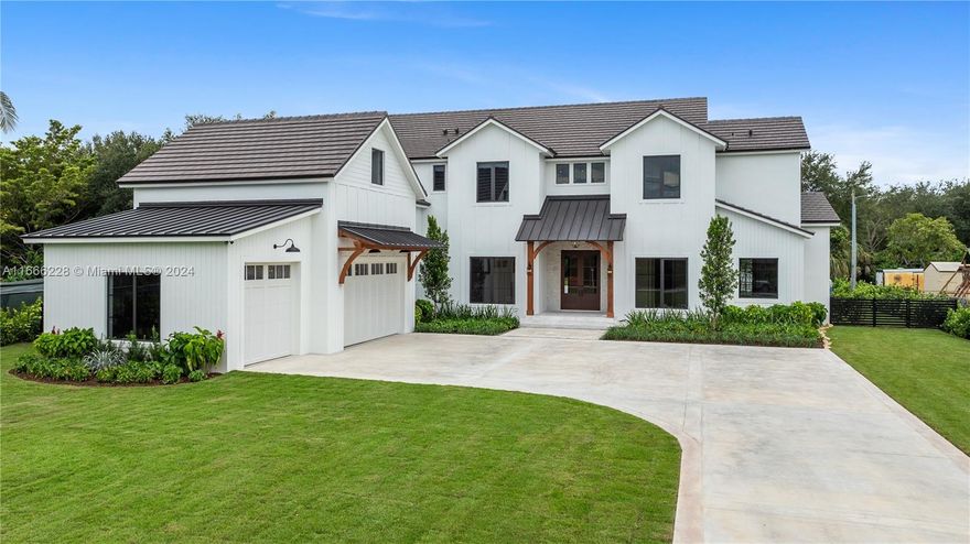 Indulge in luxury with this newly built 5-bedroom, 5.5-bathroom estate spanning 4,966 sq. ft. The interior boasts a  bonus room with an additional 600 square feet and a dramatic spiral staircase, impact windows throughout, a living room with soaring ceiling height and a cozy butane fireplace. High-end stunning kitchen that would make any chef blush featuring Wolf gas range, double islands and dual sinks, walk-in pantry, wine bar with cooler, walk-in coffee bar, and a well-designed laundry room. Step outside to your private cabana, complete with a built-in BBQ and sink, perfect for entertaining. A stunning below-ground pool and 3-car garage complete this exquisite home. Located in a desirable neighborhood, this property defines modern luxury. Schedule your showing today!