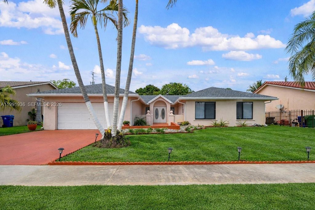 Photo of 9131 N Lake Miramar Cir, Miramar, FL 33025 (MLS # A11991936)