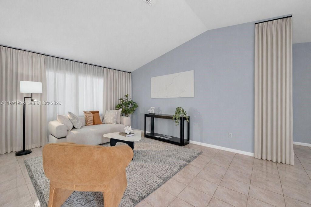 Photo of 9131 N Lake Miramar Cir, Miramar, FL 33025 (MLS # A11991936)