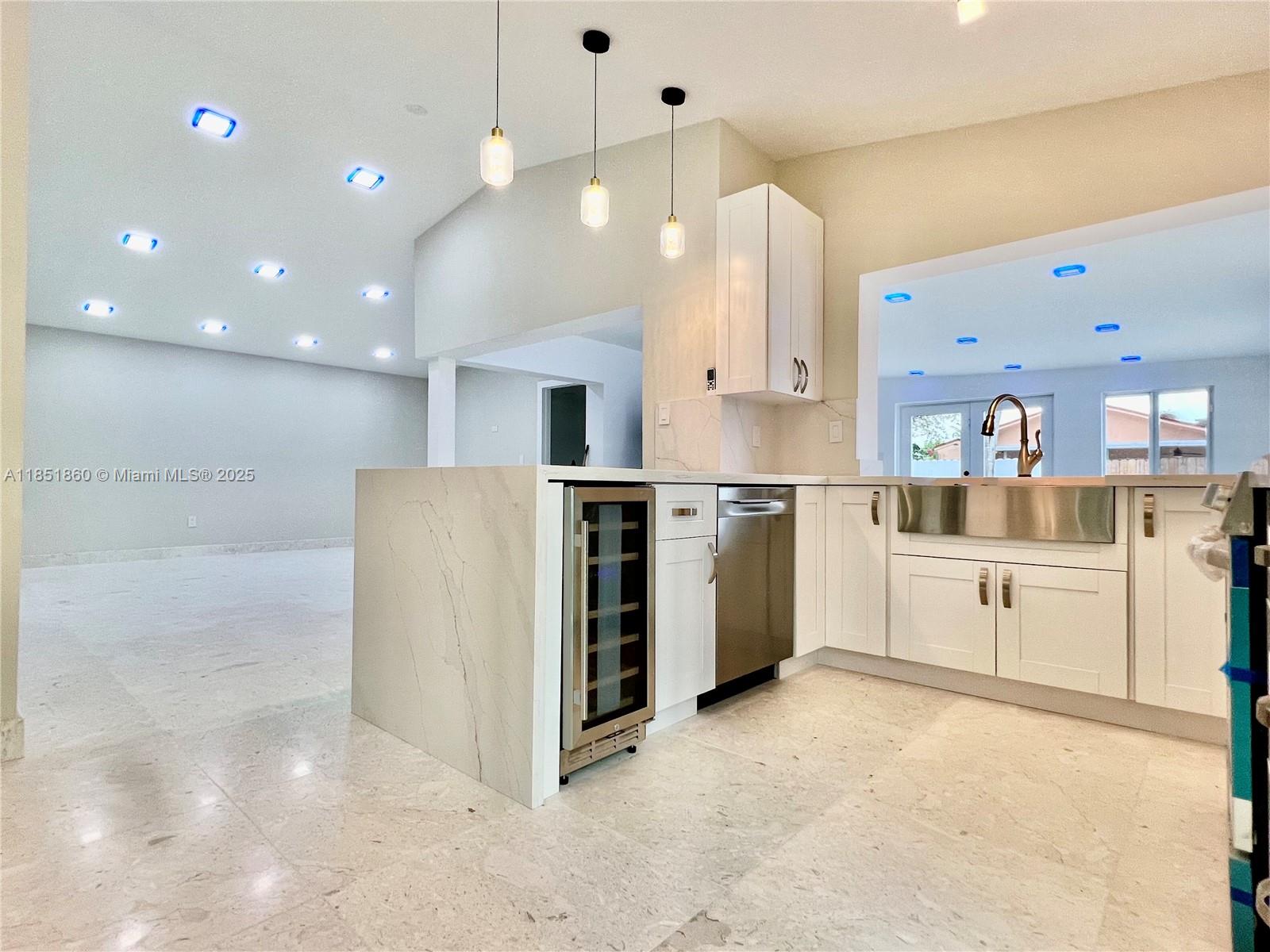Be the first to enjoy this Beautiful Fully Remodeled Home. Much attention to detail + design. Open Layout & Split Floorplan. Natural Stone Floors and Refreshing Sunlight thought the entire home. White Shaker Farm Sink Kitchen. Calacatta Grey & Gold vein Quartz Countertops w/ Flowing Waterfall. Double Bar Top seating area. New Stainless Steel Frigidaire Gallery appliances. Impact Windows & Doors. Mood setting LED lighting throughout. Color LED lighting in the kitchen + main living area. Double Master Bedrooms w/ Walk In Closets. LED Mirrors. LED Low Profile fans. Massaging Jet Master Shower. Built In Closets in Bedrooms. New DuraFence + Gates for Privacy. Concrete Squares + Grass Turf Driveway. Security Gate. Recent Roof. Room for Pool, Boat, RV Entertaining. No HOA! A+ Schools & Location!