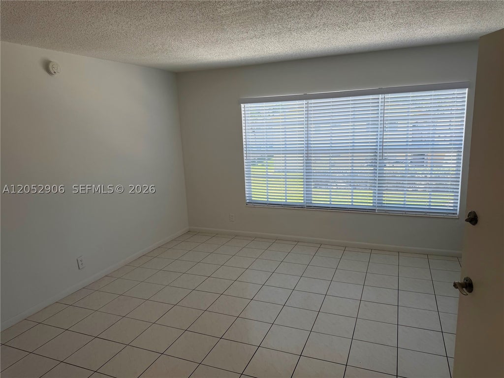 Photo of 3220 NE 10th St #17, Pompano Beach, FL 33062 (MLS # A12052906)