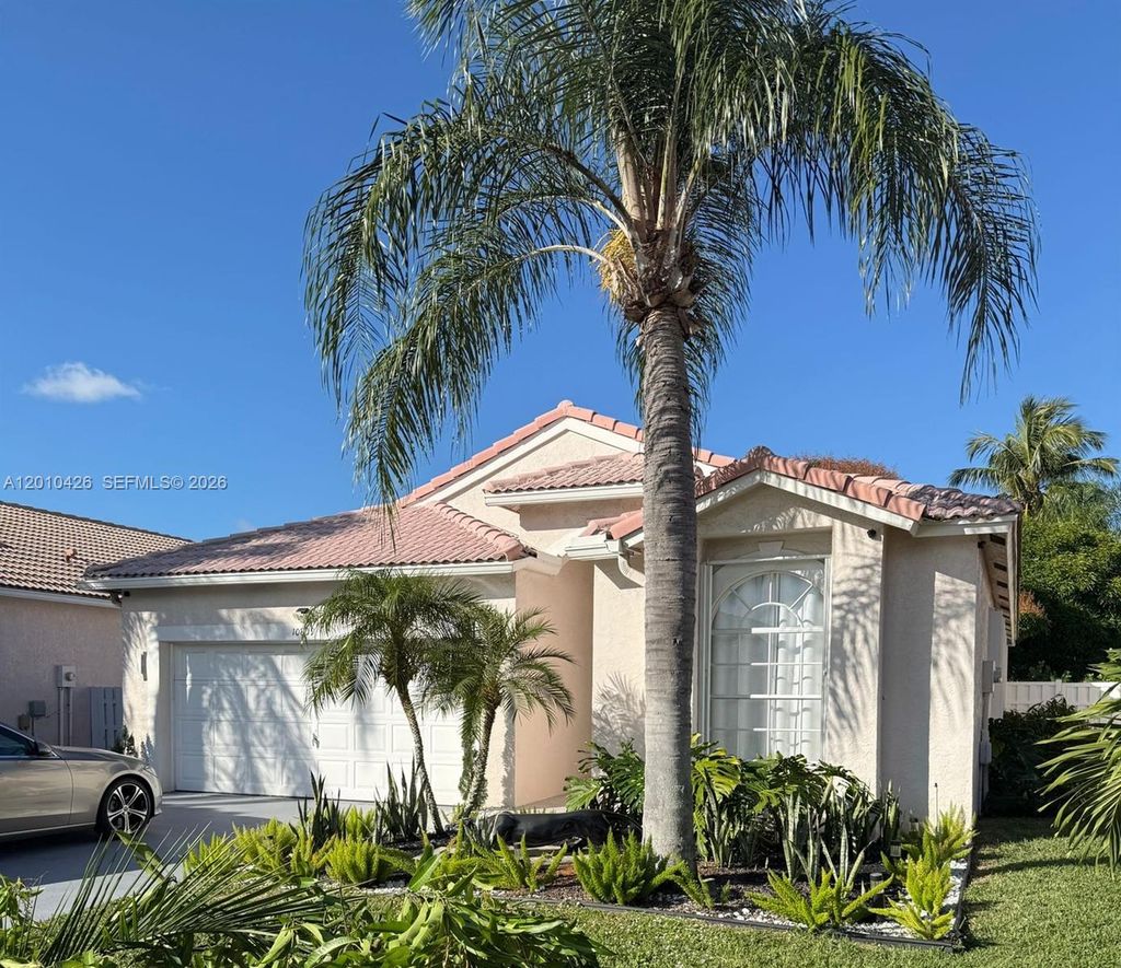 Photo of 10809 Madison Dr, Boynton Beach, FL 33437 (MLS # A12010426)