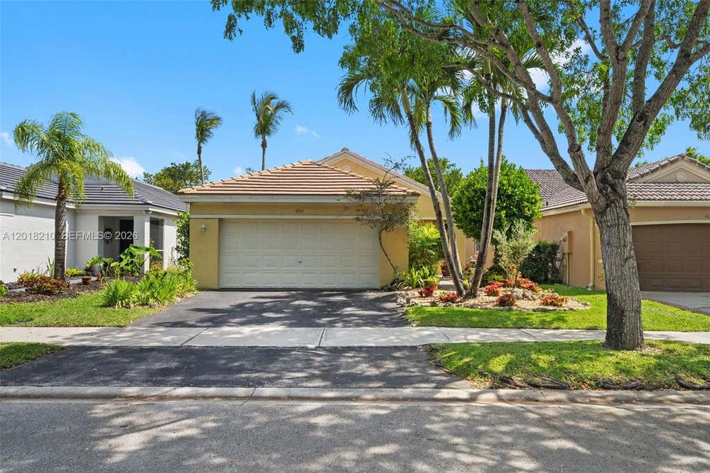 Photo of 4334 Mahogany Ridge Dr #4334, Weston, FL 33331 (MLS # A12018210)