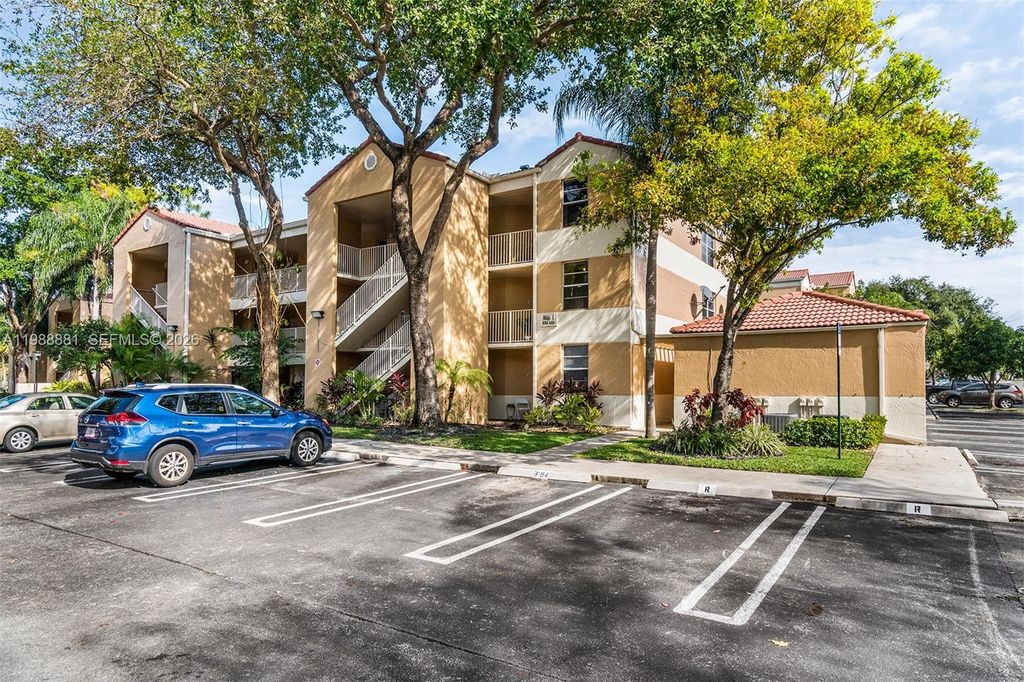 Photo of 8302 NW 24th St #8302, Coral Springs, FL 33065 (MLS # A11988881)