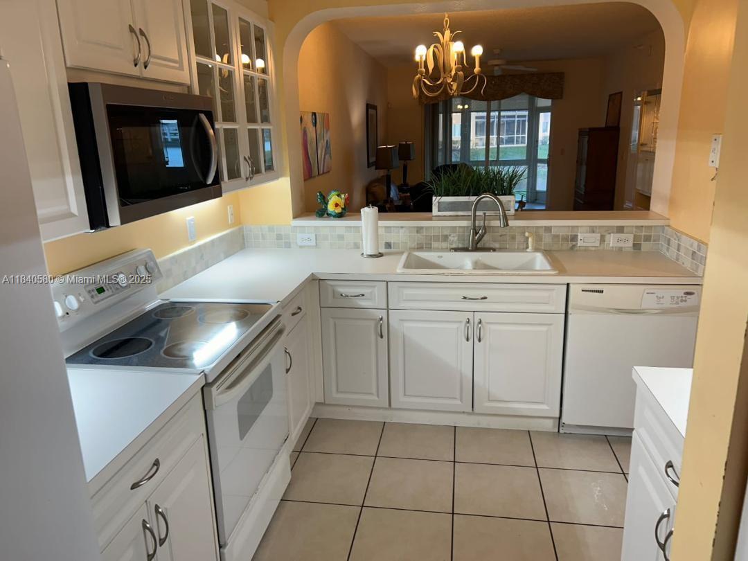 A spacious 2/2 unit in the popular SOUTHAMPTON - KINGS POINT 55+ community! 24-hr gated community. Well maintained & tiled throughout. Relax & enjoy the picturesque water view! Front & back patios. Parking space is conveniently located in front of the unit. Community offers an array of activities to enjoy daily, including a fitness center, indoor & outdoor pools, tennis, & more. A theater presents a variety of entertainment. Close to major highways, restaurants, & shopping.