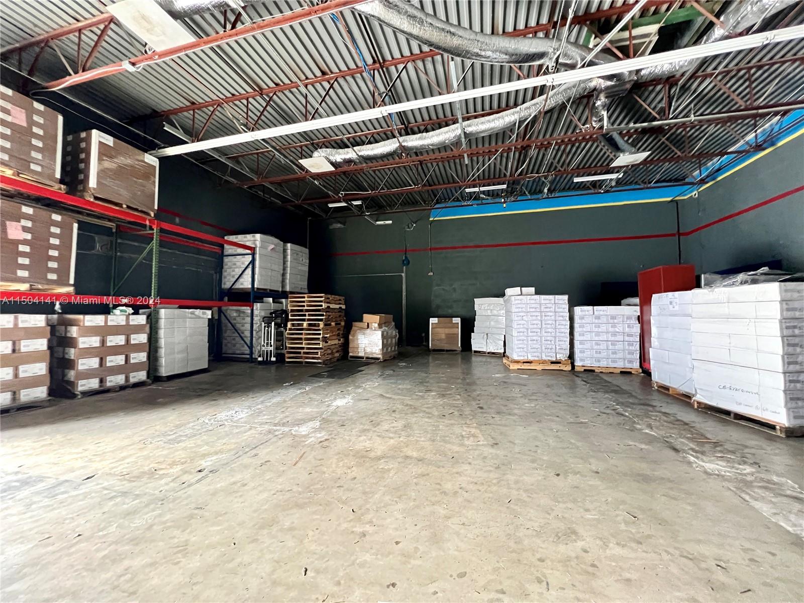 Fantastic warehouse located in Hallandale Beach! Prime location just east of I-95; One block north of Hallandale Beach Blvd. The 2,200SF corner unit features impressive high ceilings, two door entrances, and a convenient roll-up door. Ideal for a versatile and various uses! NO AUTOMOTIVE BUSINESSES.