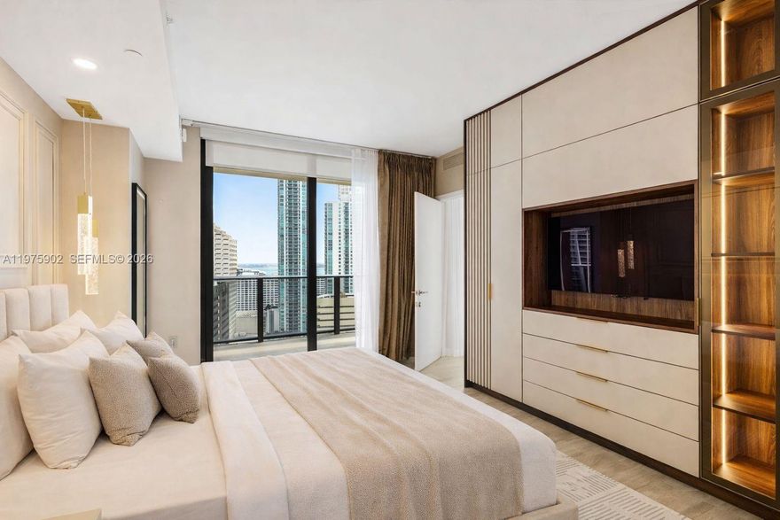 Fully furnished, renovated corner 2BR + Den, 2.5BA residence at Brickell Heights East in the heart of Brickell. Thoughtfully upgraded with custom built-out closets & drawers, crown molding, wood paneling details, a stone-quartz accent wall, upgraded lighting, electric window treatments, and a new LG W/D. Kitchen features new Bosch dishwasher + water filtration system. Highly desirable east and west exposures offer both sunrise and sunset views. Expansive wraparound balcony and floor-to-ceiling windows fill the residence with natural light. Excellent storage throughout. 1 assigned parking space. 
Amenities include: Rooftop pool, state-of-the art fitness center, jacuzzi, kid's playroom, 24/7 concierge, steam + sauna rooms, and more! 
Prime location steps from Brickell City Centre, dining, shopping, and nightlife. Easy to show; call LA.