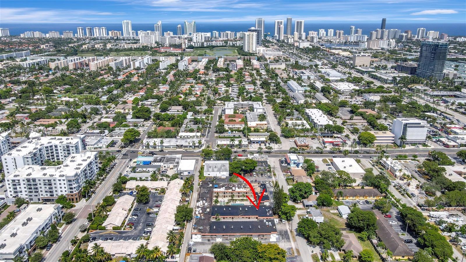 FURNISHED TURNKEY CORNER condo located on the 1st floor in a great location in Hallandale Beach. The kitchen was updated a few years ago with new cabinets, appliances and countertops. This 2 bed/2 bath has impact windows throughout, ceramic tile flooring and an enclosed back patio area. The primary bedroom has it's own private bathroom and plenty of closet space. Brand new 2025 Trane AC and newer water heater. Parking spot is located right next the condo. Small building, only 2 stories and laundry room is on the second floor. Building has a pool in the middle courtyard area and you have access to it from your ground floor balcony, a sitting area, BBQs, shuffleboard, etc. Great location close to the beach, Gulfstream, Aventura mall, Ft Laud. Int. Airport, restaurants, shopping and more.