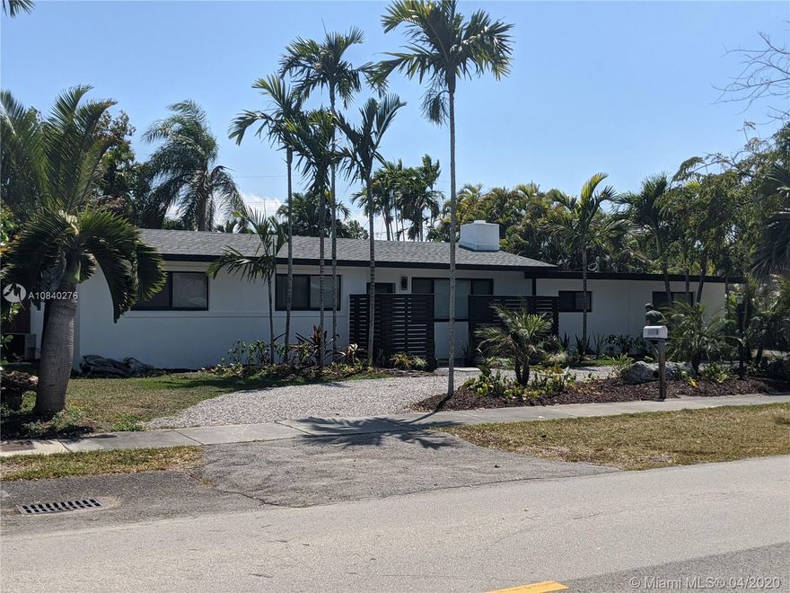 Remodeled property footsteps away from all the wonderful shops and restaurants of Pinecrest FL. This unique property is highlighted with accents of lush tropical landscape throughout this very spacious property. Inside the house, you will find that you are greeted with a warm feeling as you walk a few feet and enter your awesome living room which features panoramic bay windows giving you a stunning view of all the wonderful plants and botanical features of the backyard.