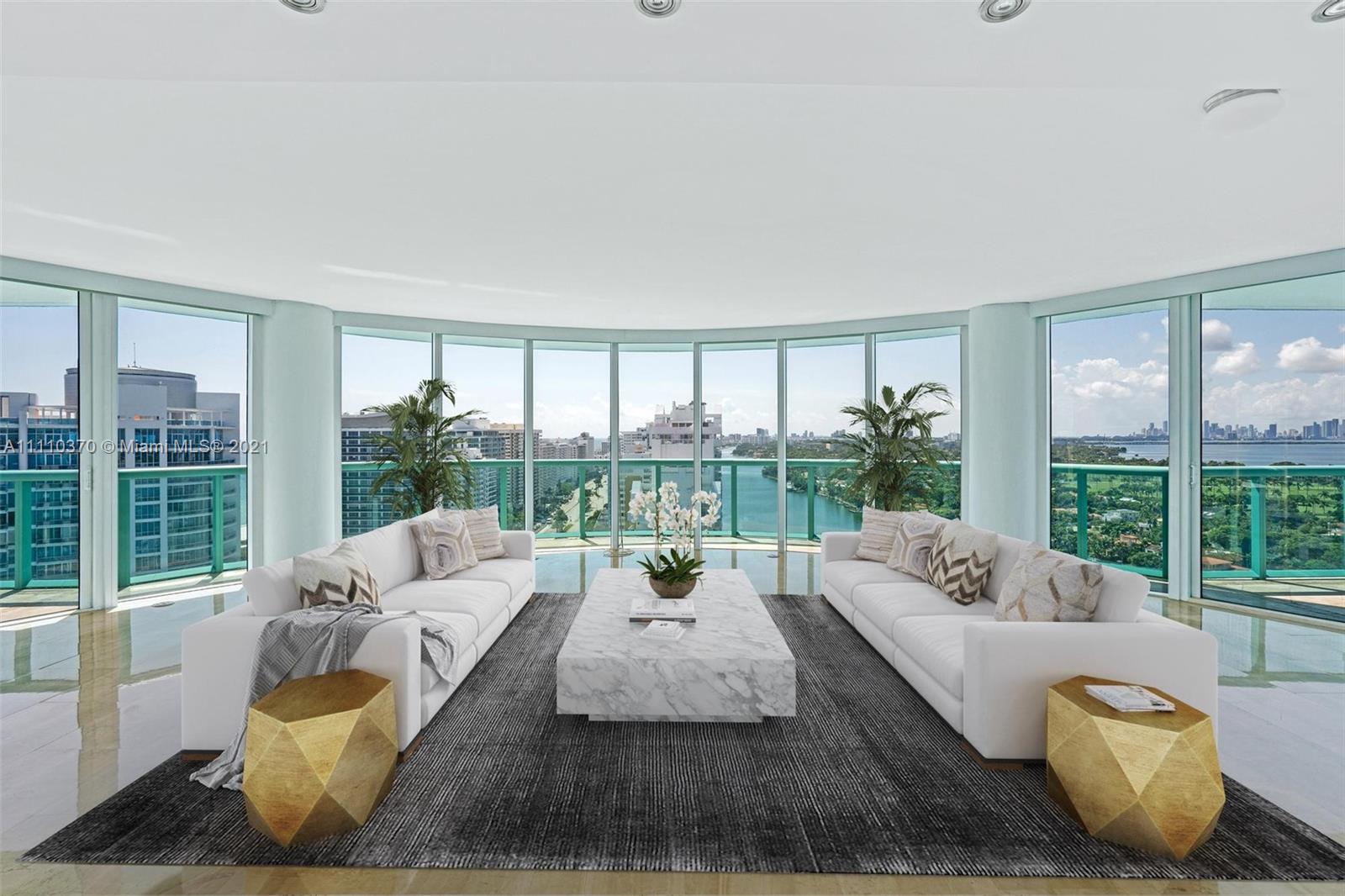 Dreams do come true!  This magnificent 2800 sq ft, full floor home has floor to ceiling windows in every room to admire the breathtaking 360 degree views.  The private elevator whisks you to the 22nd floor where there are 3 en-suite bedrooms and a half bath for guests. The high end finishes, marble floors and gourmet kitchen make this a perfect home for entertaining! Relax in your oversized master suite that includes an extraordinary amount of closet space and an infinity garden tub. You are just steps away from the beach and close to shopping and restaurants. Dock your boat in the 33' boat slip equipped with water and electric. This condo comes with 3 parking spaces. Amenities include a pool, an exercise room and 24/7 security.  Click on the virtual tour to experience this fantastic home!