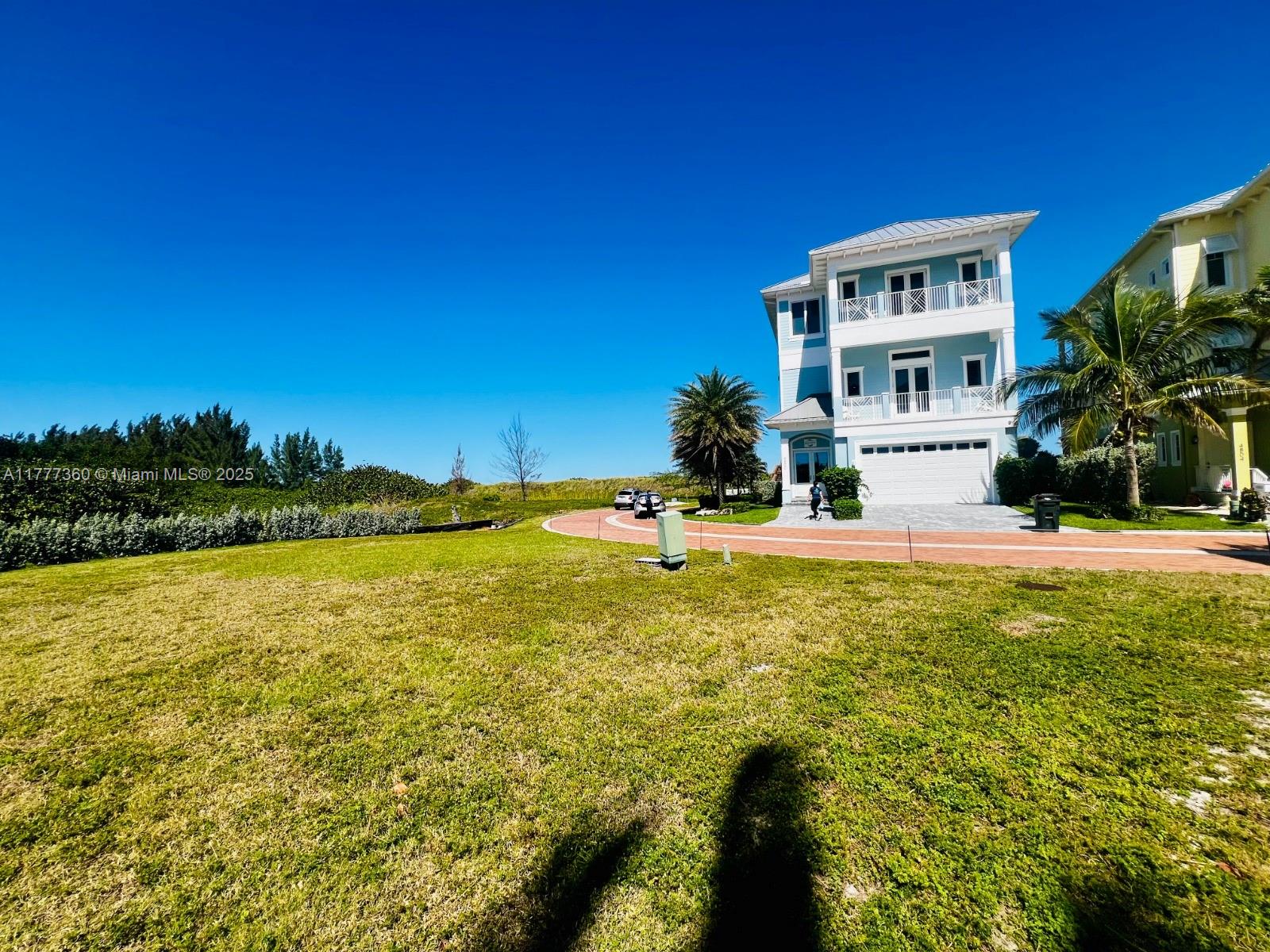 Ocean View Lot with customs plans in desirable Oceanfront Community on desirable Hutchinson Island. Build your dream home in this private gated enclave of custom built Key West style homes. Watersong is a beautiful intimate neighborhood featuring brick paver roads and a community swimming pool.