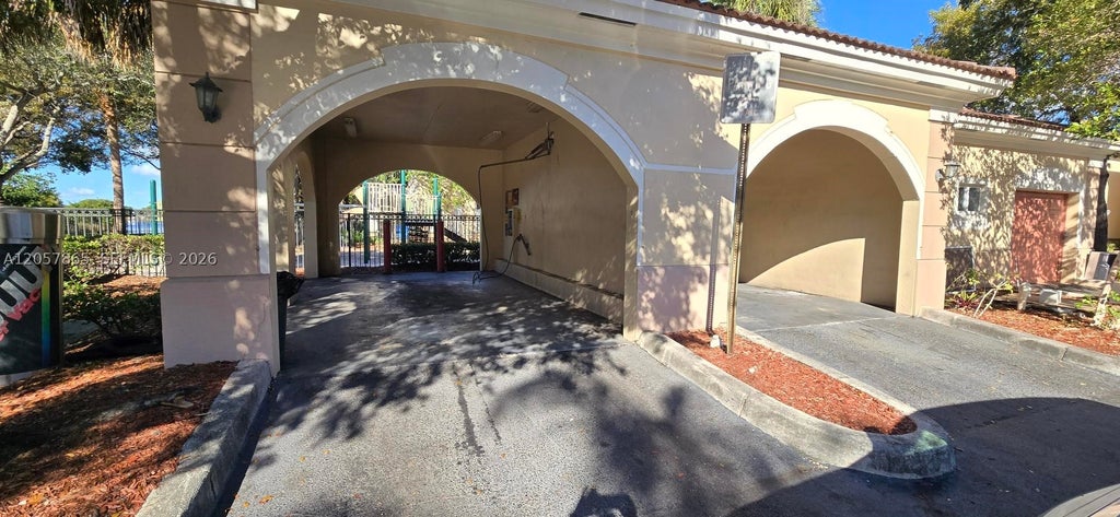 Photo of 2589 Centergate Dr #202, Miramar, FL 33025 (MLS # A12057865)