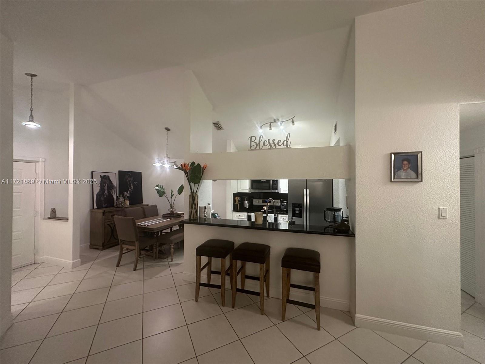 Beautiful 2 bedroom, 2 bathroom condo with 2 parking spaces available! 2 Master bedrooms, with full bathrooms. Updated appliances, high ceilings, washer and dryer inside unit, A/C & Water Heater less than 1yr. Cozy & spacious balcony with storage room. Tile throughout. Basketball court, kids playground, clubhouse, gym, tennis courts, pool & jacuzzi inside complex with access to the Hammocks Lake that has a surrounding 7-mile walking and bike path. Hammocks association also includes 3 clubhouses and community pools. Also includes 24/7 public safety services and much more! Will not last!