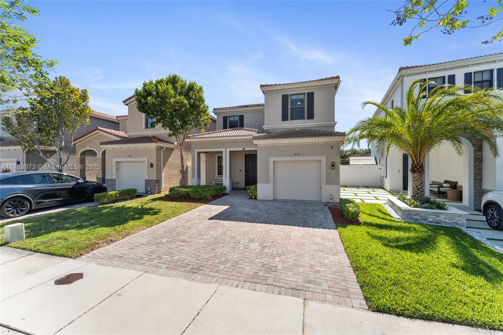 Welcome to this stunning 3-bedroom, 2.5-bath home in the highly sought-after Aventura Isles community! Spanning 2,091 sq ft, this open-concept residence features high ceilings, marble floors, a gourmet kitchen with stainless steel appliances, granite countertops, and a brand-new oven. The master suite includes a walk-in closet, dual sinks, a soaking tub, and a glass-enclosed shower. Upstairs, a convenient laundry area boasts a new dryer. The private, gated backyard is perfect for relaxing or entertaining. Solar panels and a smart alarm system add efficiency and security. Located in a gated, 24/7 secured community with a clubhouse, walking trails, tennis courts, community pool, parks, and playgrounds, it’s minutes from Aventura Mall, beaches, and major highways.