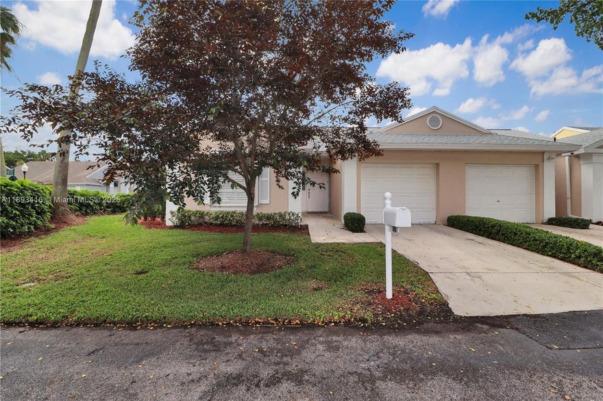 This home is truly move-in ready, featuring a long list of significant upgrades and improvements. Enjoy a fresh start with new paint and laminate flooring throughout, as well as ceramic tile in the kitchen and entryway. All polybutylene water pipes were professionally replaced with new PEX and copper, the central AC/Heating System was replaced in 2024, and the water heater was replaced this year. Additional updates include a new patio screen and door, a new fire-rated garage door. The home is secured with aluminum accordion shutters on all doors/windows, and a Category 3-rated hurricane garage door.  The excellent $441/month HOA includes access to the North Gate Village Clubhouse, featuring an Olympic-sized pool, gym, and more, as well as 24/7 security.