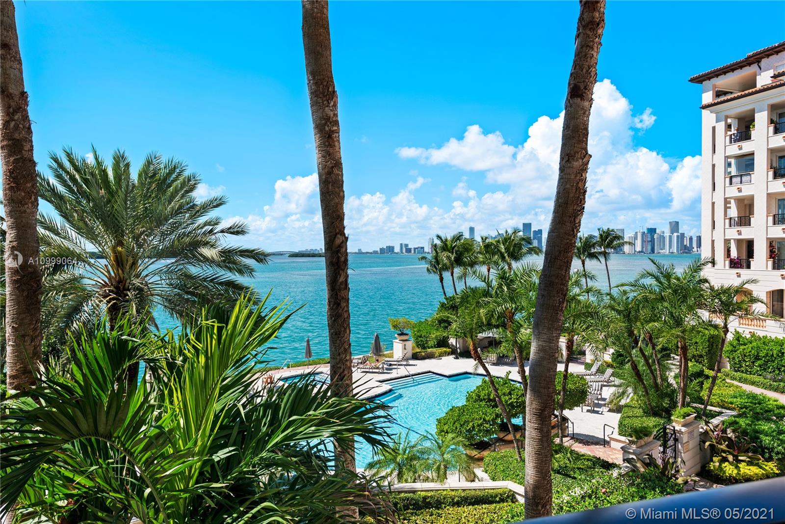 Visit the BEST priced 4 bedroom 4.5 bath unit on Fisher Island! Live the Fisher Island lifestyle in this spectacular 2nd floor Bayview corner unit with mesmerizing views of the Miami Downtown skyline, Virginia Key and pool. Features include: SW exposure, marble floors throughout, gourmet kitchen with center island and top of the line appliances, spacious open living and dining rooms, impact glass doors, expansive wrap around terraces perfect for entertaining and many more features. Visit this exceptional unit! Easy to show.