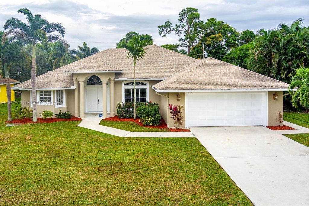 Photo of 614 SW Twig Ave, Port St Lucie, FL 34983 (MLS # A11837722)