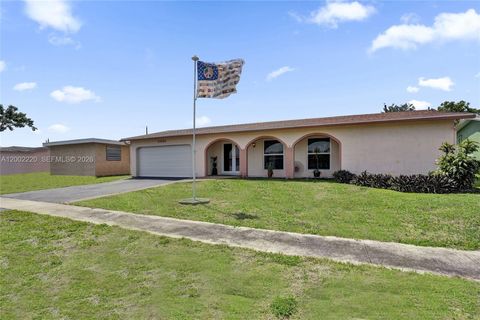 Photo of 11960 NW 31st St, Sunrise, FL 33323 (MLS # A12002220)